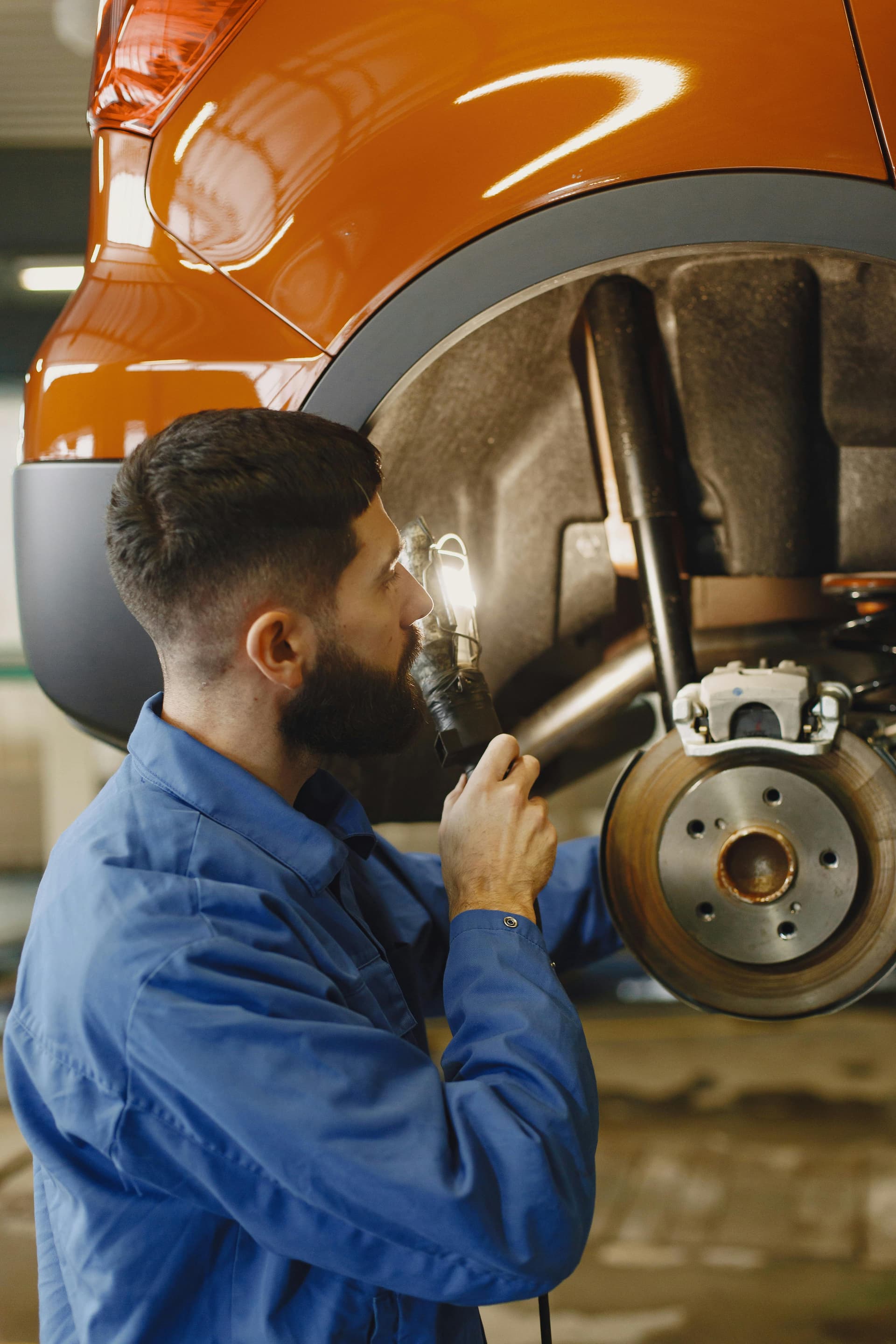 car with exposed brake pads