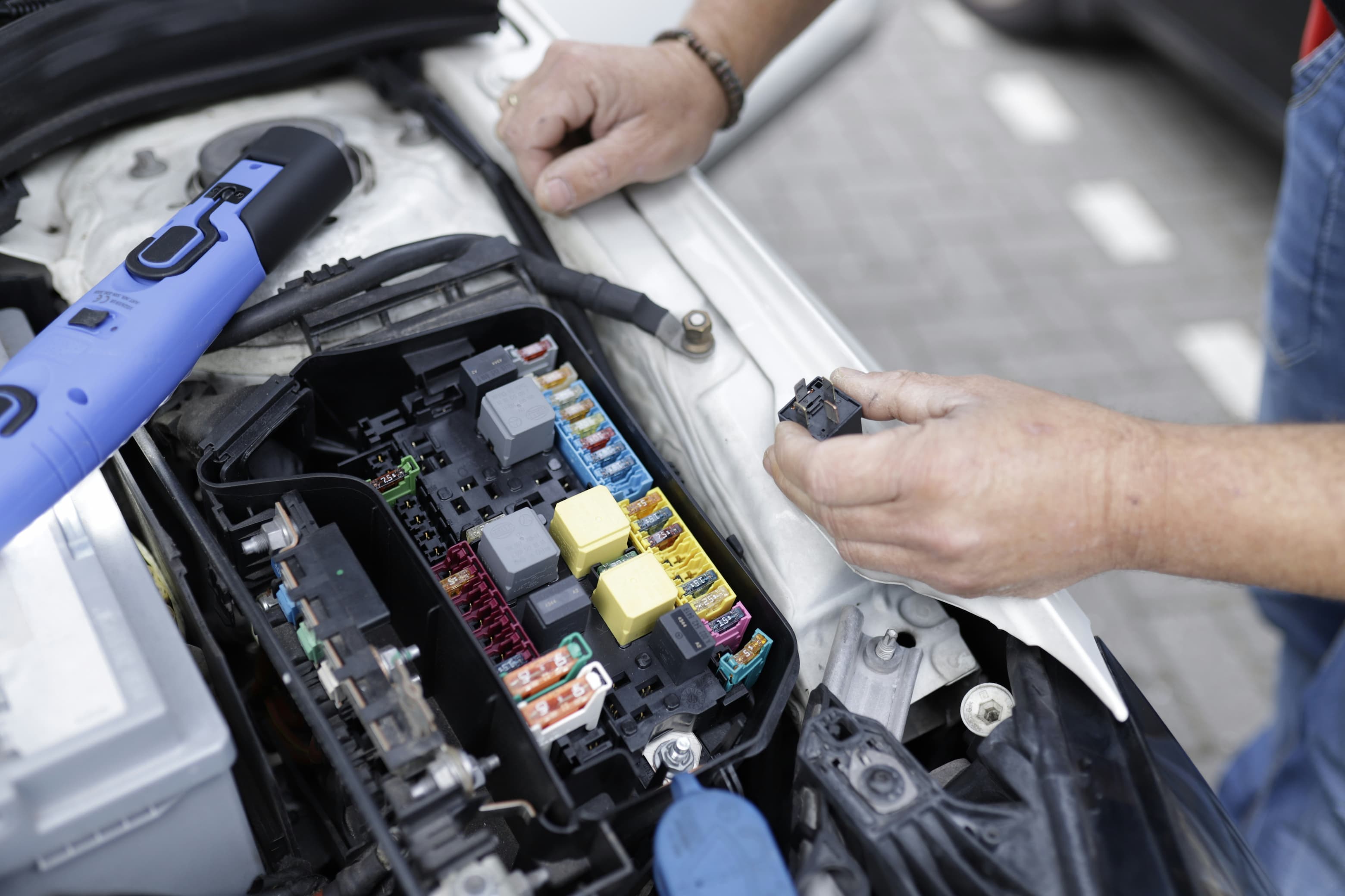 electrical components inside of car hood